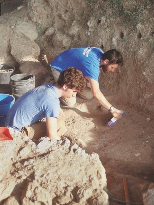 Students Keegan Brewster and Jesse Dedic excavate in an area of the City of Gath archaeological site.